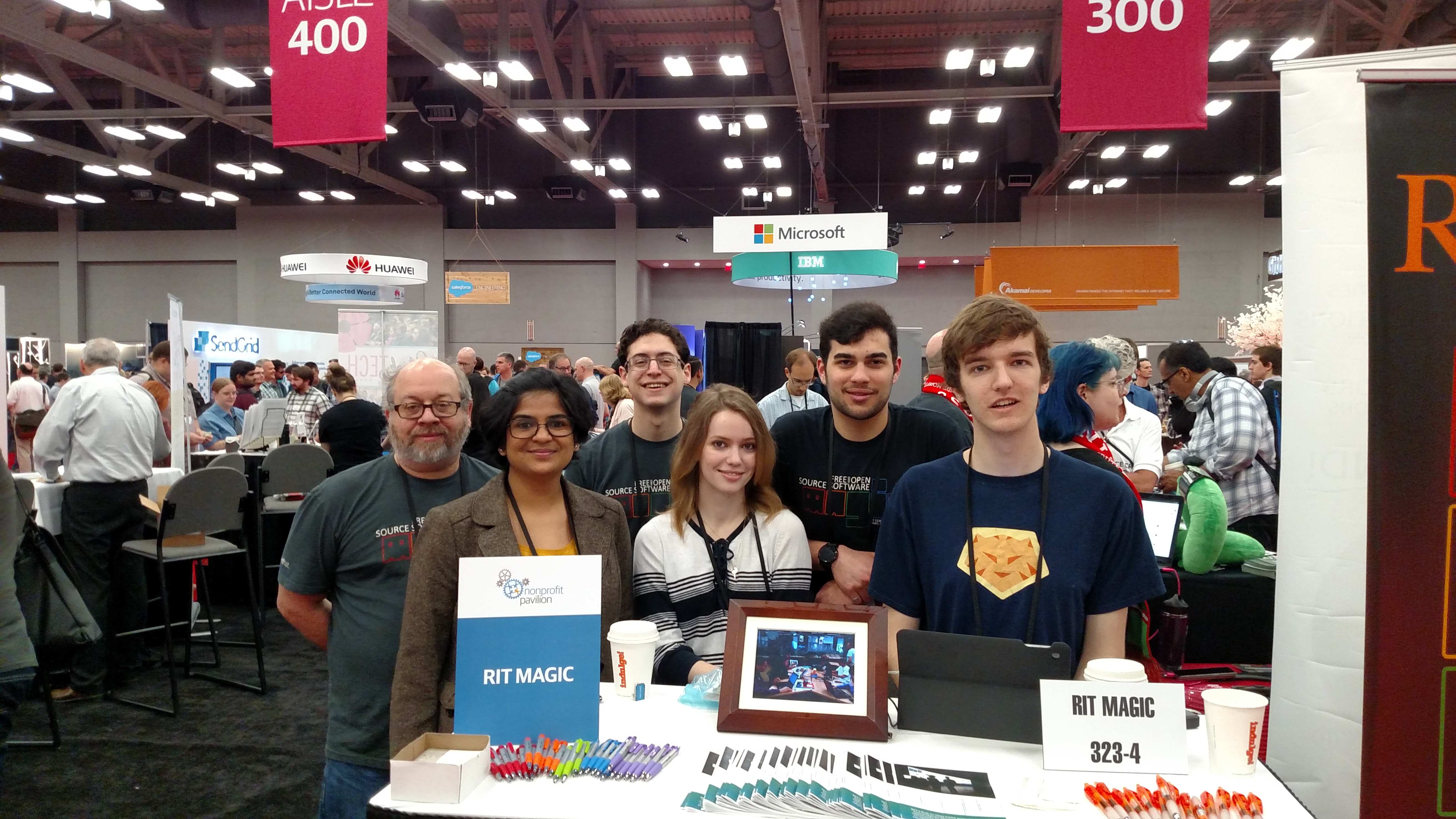 FOSS@MAGIC booth volunteers at O'Reilly Open Source Convention 2017